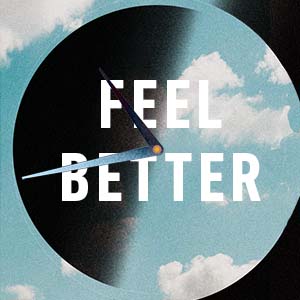 Clock overlayed with clouds and black space that reads "Feel Better"